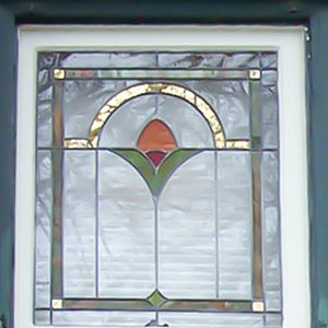 gold mirrored stained glass window