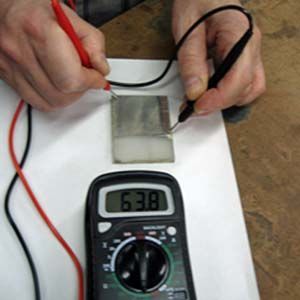 multimeter shows electrical flow through silver 
