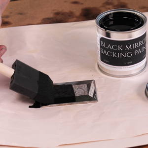 Using Black Mirror Backing Paint to paint the silver on a piece of beveled glass